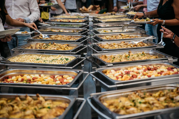Hugh buffet with meat, vegetables and pasta at a wedding