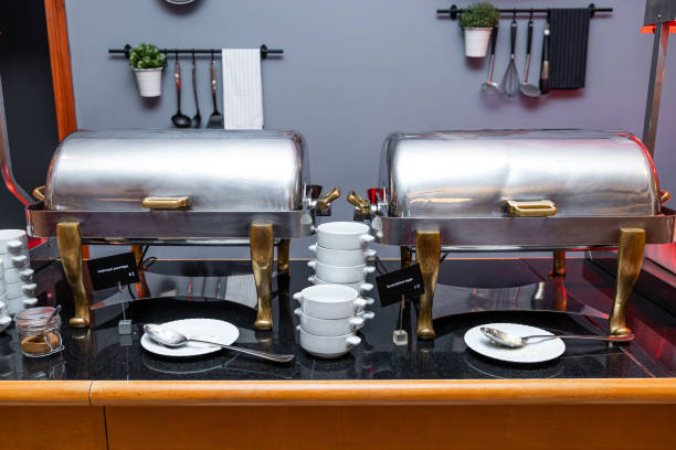 Elegant Hotel Breakfast Buffet Spread with Chafing Dishes and Modern Decor Elegant Hotel Breakfast Buffet Spread with Chafing Dishes and Modern Decor